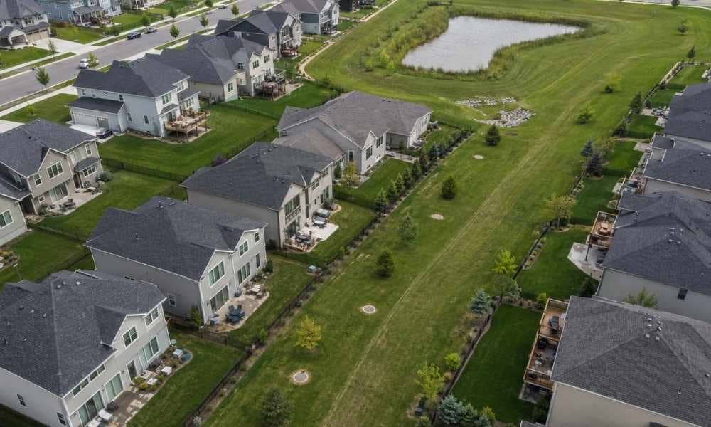 Aerial view of subdivision design planning with storm sewer drainage features in Kent County MI